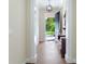 Elegant entryway with hardwood floors and antique furniture at 425 Sandy Bluff Trl, Deland, FL 32724