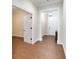 Inviting entryway with wood-look flooring and neutral walls at 425 Sandy Bluff Trl, Deland, FL 32724
