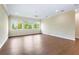 Spacious bedroom with hardwood floors and large windows at 425 Sandy Bluff Trl, Deland, FL 32724