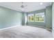 Light green bedroom with carpet and ceiling fan at 425 Sandy Bluff Trl, Deland, FL 32724