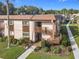 Well-maintained building exterior with landscaping and walkway at 600 N Boundary Ave # 106D, Deland, FL 32720