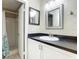 Bathroom with a white vanity, pedestal sink, and shower/tub combo at 600 N Boundary Ave # 106D, Deland, FL 32720