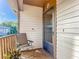 Private balcony with chair and small potted plant at 600 N Boundary Ave # 106D, Deland, FL 32720