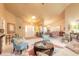 Open living area with high ceilings, hardwood floors, and a view to the dining area at 6225 Cranberry Dr, Port Orange, FL 32127
