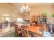 Bright dining room with wood table and chairs, open to the living room at 6225 Cranberry Dr, Port Orange, FL 32127