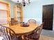 Simple dining area with a round wooden table and four chairs at 1002 Beulah Dr, Edgewater, FL 32132