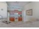 Well-equipped kitchen featuring granite countertops and ample cabinetry at 1900 N Atlantic Ave # 1601, Daytona Beach, FL 32118
