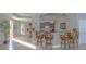 Shared kitchen space with barstools and cabinetry at 1900 N Atlantic Ave # 1601, Daytona Beach, FL 32118