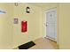 Well-lit condo entry with security features at 1900 N Atlantic Ave # 1601, Daytona Beach, FL 32118