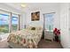 Bedroom with ocean view and tropical bedding at 1900 N Atlantic Ave # 1601, Daytona Beach, FL 32118