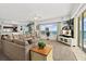 Bright living room boasts ocean views, comfortable seating, and access to a balcony at 1900 N Atlantic Ave # 1601, Daytona Beach, FL 32118