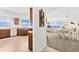 Open kitchen with wood cabinets and tile floors at 1900 N Atlantic Ave # 1601, Daytona Beach, FL 32118