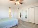 Spacious bedroom with a queen bed, large closet, and access to bathroom and hallway at 3333 S Atlantic Ave # 605, Daytona Beach Shores, FL 32118