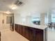 Modern community kitchen with stainless steel appliances at 3333 S Atlantic Ave # 605, Daytona Beach Shores, FL 32118