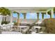 Community outdoor kitchen with grills and dining area at 3333 S Atlantic Ave # 605, Daytona Beach Shores, FL 32118