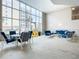 Community lounge with comfortable seating and large windows at 3333 S Atlantic Ave # 605, Daytona Beach Shores, FL 32118