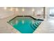 Inviting indoor pool with tiled flooring and ample natural light at 3333 S Atlantic Ave # 605, Daytona Beach Shores, FL 32118