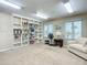 Well-lit library with bookshelves and comfortable seating at 3333 S Atlantic Ave # 605, Daytona Beach Shores, FL 32118