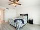 Guest bedroom with ocean view and ceiling fan at 3333 S Atlantic Ave # 605, Daytona Beach Shores, FL 32118