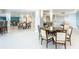 Spacious community room with tables, chairs, and a relaxing atmosphere at 3333 S Atlantic Ave # 605, Daytona Beach Shores, FL 32118