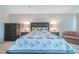 Main bedroom with a plush bed and neutral color palette at 4 Oceans West Blvd # 301C, Daytona Beach Shores, FL 32118