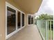 Private balcony with sliding glass doors, offering an outdoor view at 4 Oceans West Blvd # 301C, Daytona Beach Shores, FL 32118