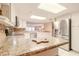 Modern kitchen with white cabinets, stainless steel appliances and granite countertops at 4 Oceans West Blvd # 301C, Daytona Beach Shores, FL 32118