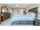 Main bedroom with ample dresser space and a comfy seating area at 4 Oceans West Blvd # 301C, Daytona Beach Shores, FL 32118