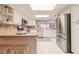Modern kitchen with white cabinets, stainless steel appliances and granite countertops at 4 Oceans West Blvd # 301C, Daytona Beach Shores, FL 32118
