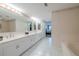 Bathroom features a double vanity, tub, and walk-in shower at 4 Oceans West Blvd # 301C, Daytona Beach Shores, FL 32118
