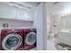 Laundry room with Samsung washer and dryer at 4 Oceans West Blvd # 301C, Daytona Beach Shores, FL 32118