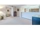 Open living area with view of kitchen and neutral color scheme at 4 Oceans West Blvd # 301C, Daytona Beach Shores, FL 32118