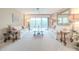 Living room boasts a neutral color palette, comfy sofas, and a large mirror at 4 Oceans West Blvd # 301C, Daytona Beach Shores, FL 32118