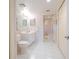Clean bathroom with white vanity and tiled floor at 4 Oceans West Blvd # 301C, Daytona Beach Shores, FL 32118