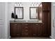 Double vanity bathroom with granite countertops and ample storage at 4747 Nw 35Th Lane Rd, Ocala, FL 34482