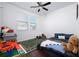 Cozy bedroom with a full-size bed and playful decor at 4747 Nw 35Th Lane Rd, Ocala, FL 34482