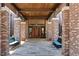 Brick entryway to the community center with benches at 4747 Nw 35Th Lane Rd, Ocala, FL 34482