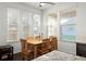 Bright dining area with a table and chairs, near kitchen at 4747 Nw 35Th Lane Rd, Ocala, FL 34482