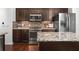 Modern kitchen with stainless steel appliances and granite countertops at 4747 Nw 35Th Lane Rd, Ocala, FL 34482
