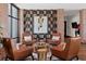 Elegant lobby with leather seating and a modern art piece at 4747 Nw 35Th Lane Rd, Ocala, FL 34482