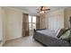 Bedroom with a double bed and window at 4766 S Atlantic Ave, Ponce Inlet, FL 32127