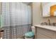 Clean bathroom with a shower/tub combo, vanity, and polka dot shower curtain at 6 Rosalie Oaks Blvd, Lake Wales, FL 33898
