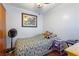 Bedroom with wood floors, ceiling fan, and a twin bed at 6 Rosalie Oaks Blvd, Lake Wales, FL 33898