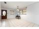 Bright dining room with tile floors and a chandelier at 6 Rosalie Oaks Blvd, Lake Wales, FL 33898