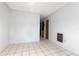 Simple hallway with tile floors and doors to other rooms at 6 Rosalie Oaks Blvd, Lake Wales, FL 33898
