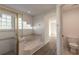 Main bathroom features a shower, tub, and toilet at 6180 Knotty Pine Ct, Port Orange, FL 32127