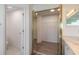 Mirrored closet and adjacent toilet at 6180 Knotty Pine Ct, Port Orange, FL 32127