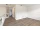 Upstairs hallway with wood-look floors at 6180 Knotty Pine Ct, Port Orange, FL 32127