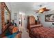 Spacious bedroom with a ceiling fan and built-in wooden wardrobe at 101 Marathon Ln, Sanford, FL 32771
