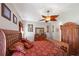 Primary bedroom with a king-size bed and ensuite bathroom access at 101 Marathon Ln, Sanford, FL 32771